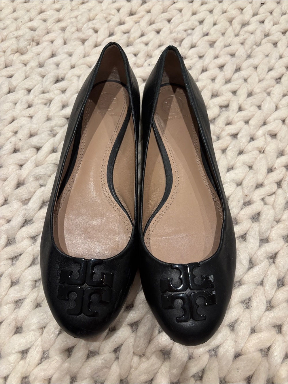 Black Leather Ballet Flats with Decorative Emblem see pic of scratch on emblem